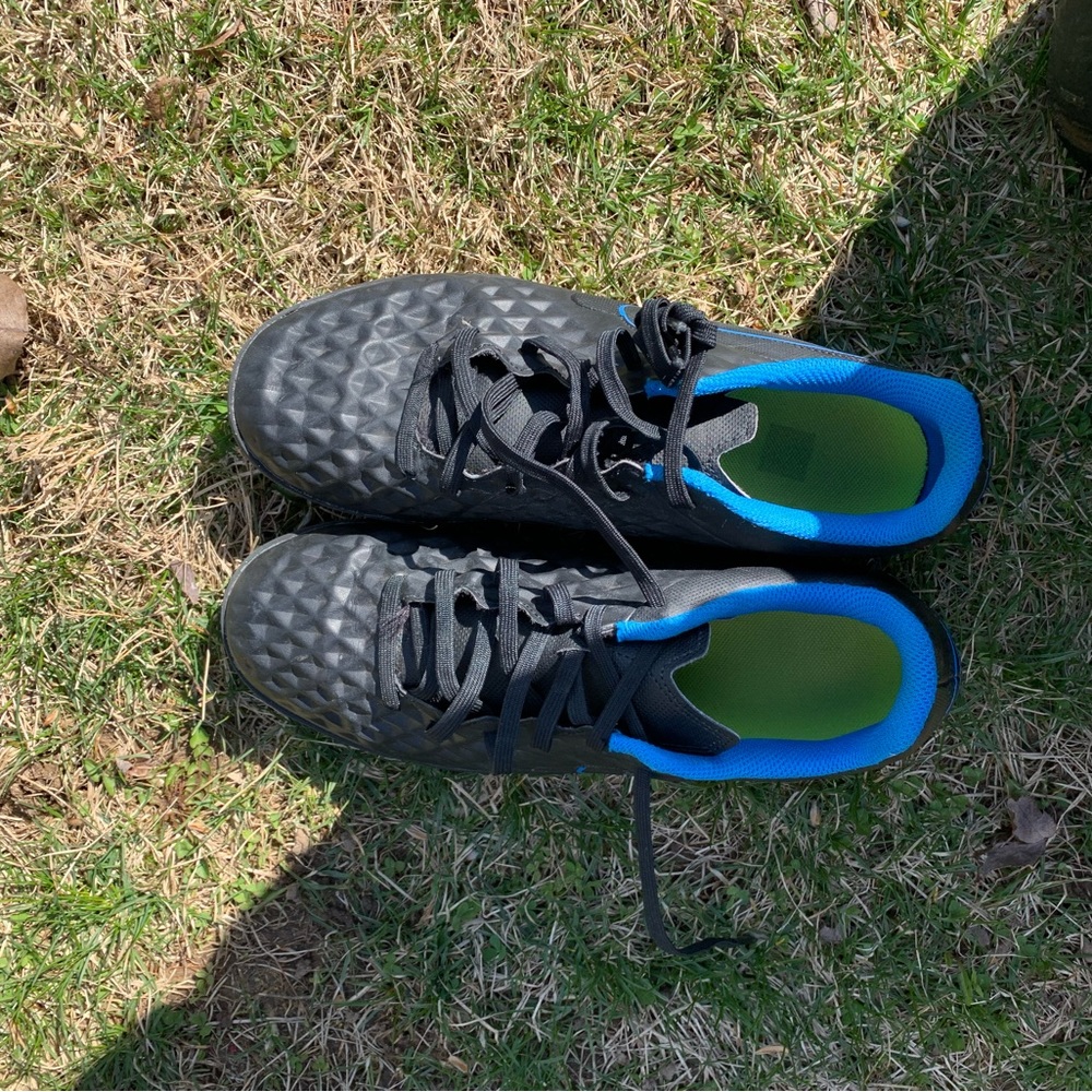 Nike Tiempo indoor soccer shoes.